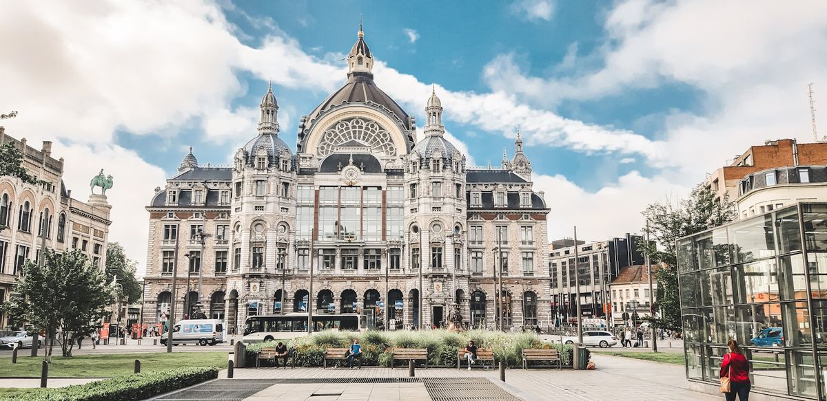 Antwerp Central station facade under blue sky
