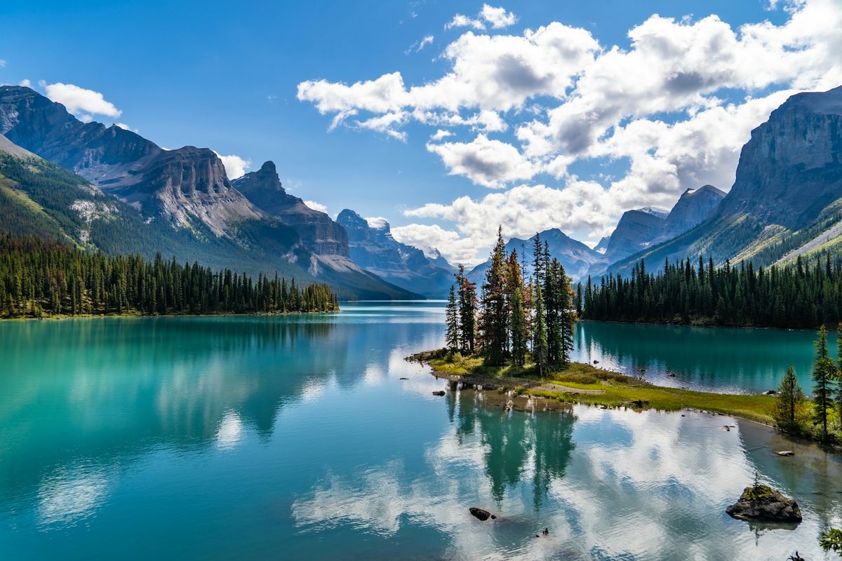 Turquoise lake with snow-capped mountains in the Canadian Rockies