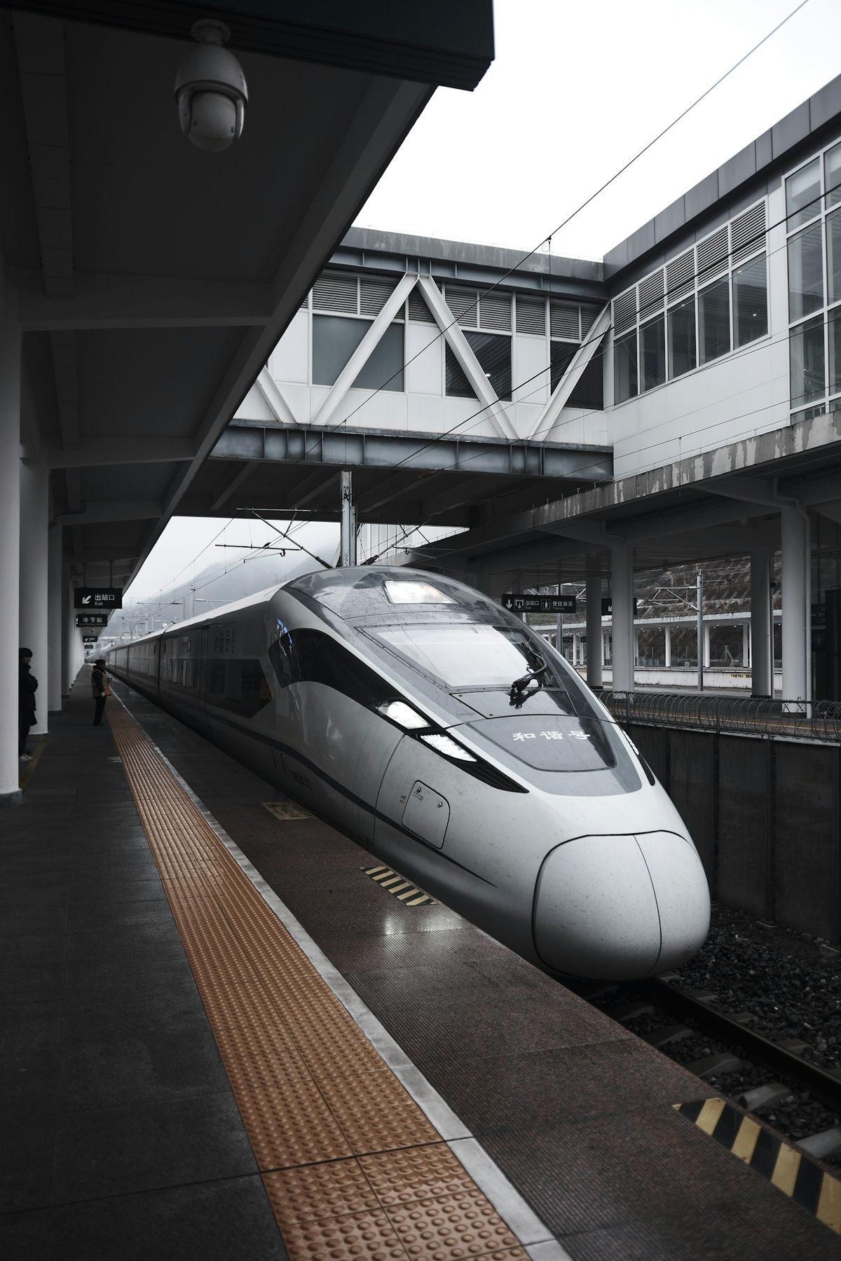 Silver high-speed bullet train at station in China