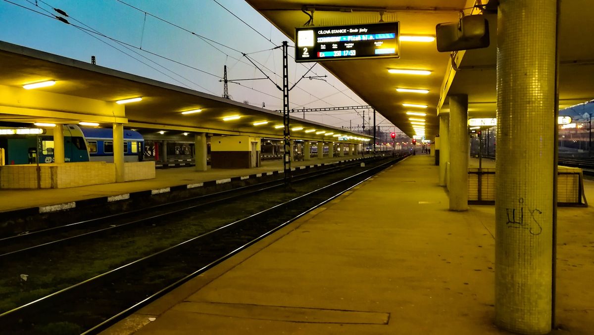 Train station with train on tracks Czech Republic