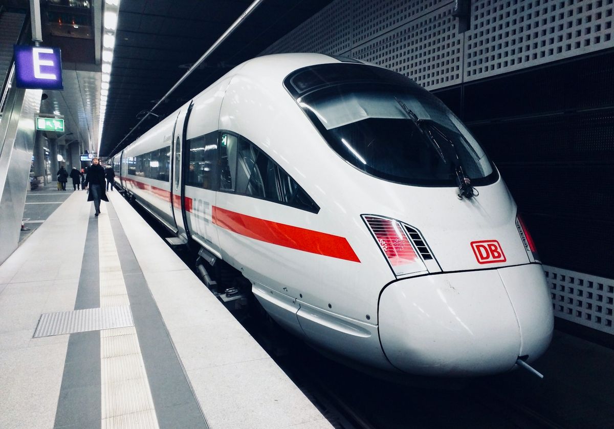 White and red Deutsche Bahn train at a German station