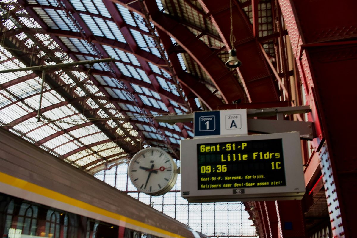 Train station departure board showing train times