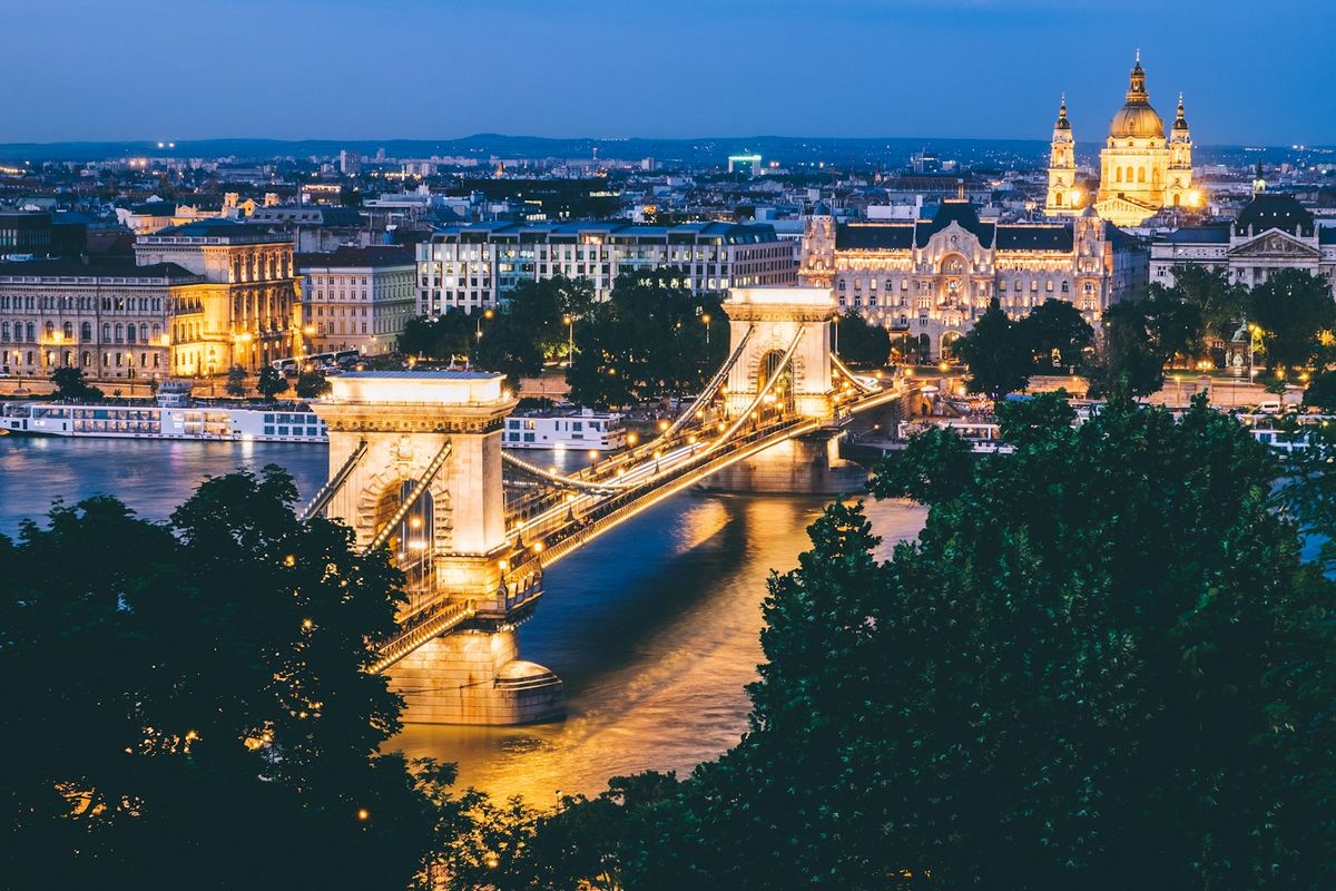 Chain Bridge over the Danube illuminated at night in Budapest