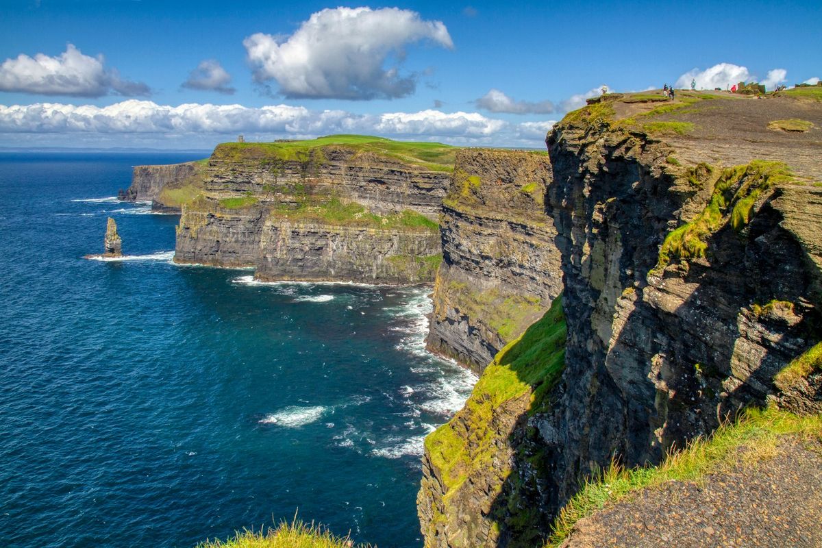 Rocky Cliffs of Moher and blue Atlantic ocean Ireland