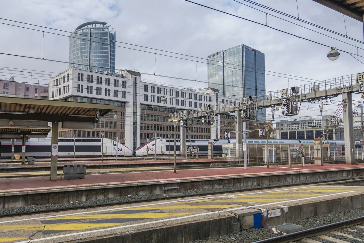 Lyon Part-Dieu train station with a train on the platform