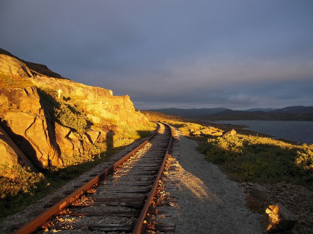 Railway track running along a Norwegian mountain slope