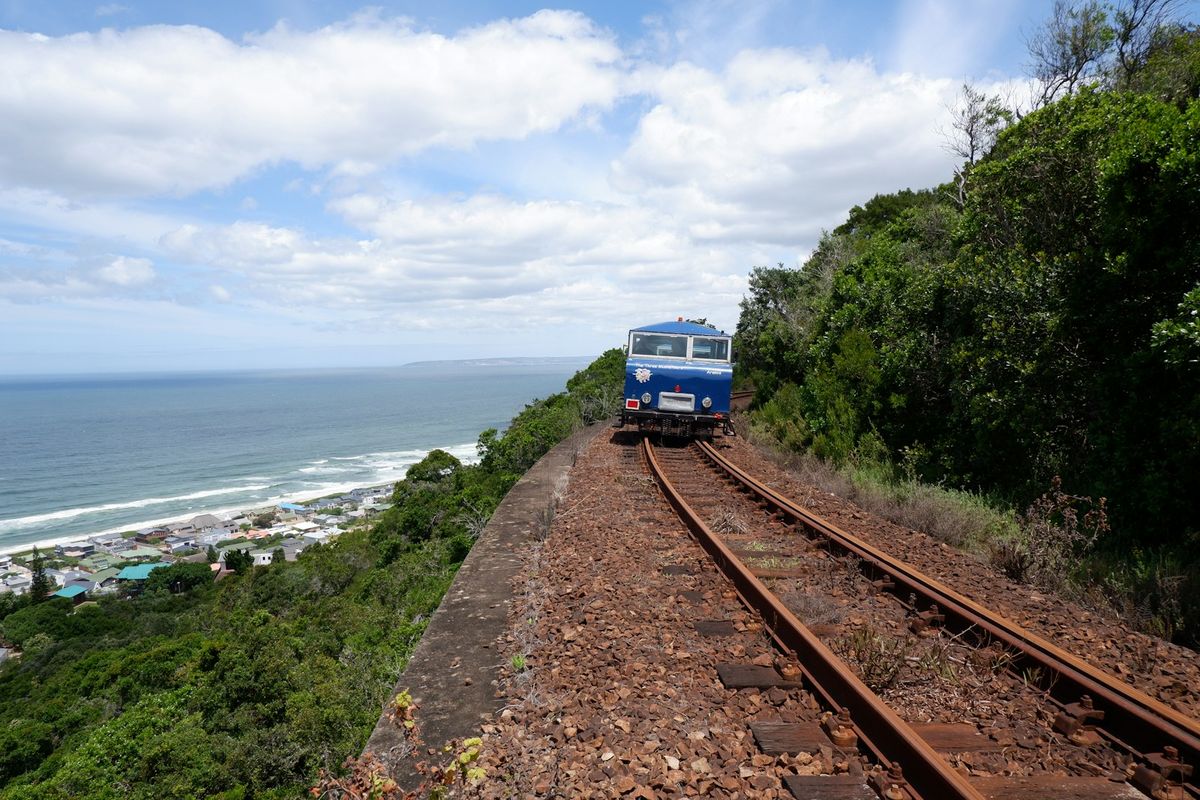 Blue train travelling along the coast, South Africa