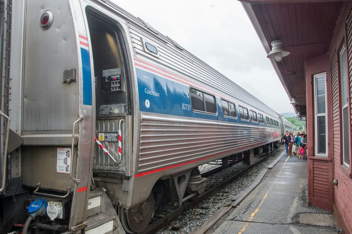 Amtrak train pulling into a station