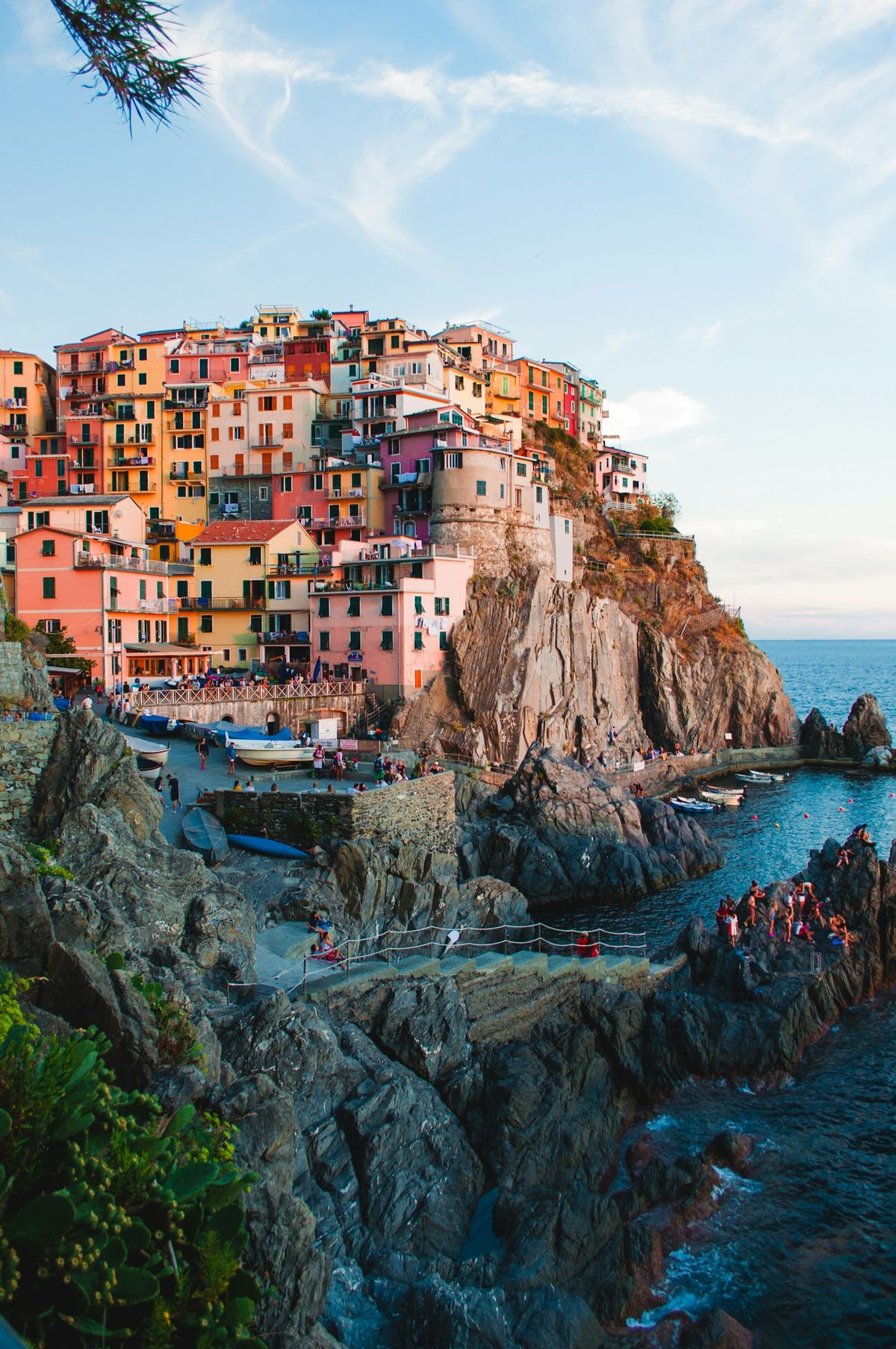 Manarola village with colorful houses on cliffs above the Mediterranean Sea