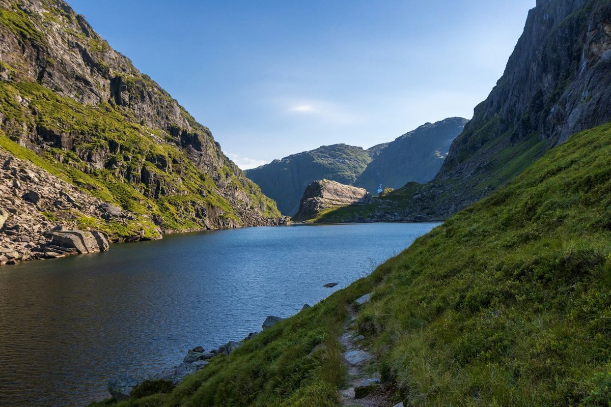 Norwegian mountain valley with fjord and dramatic landscape scenery