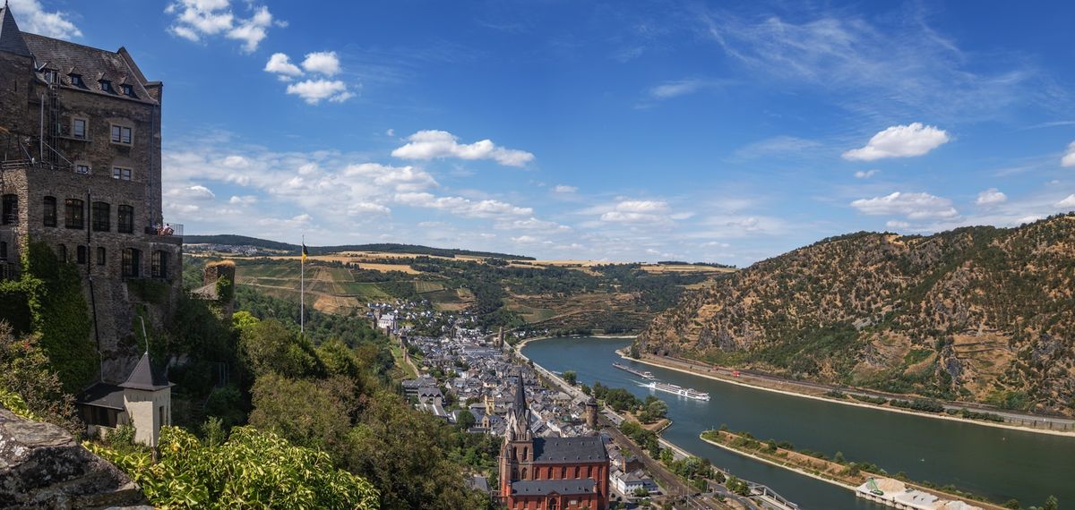 Castle overlooking a river and town along the Rhine Valley in Germany