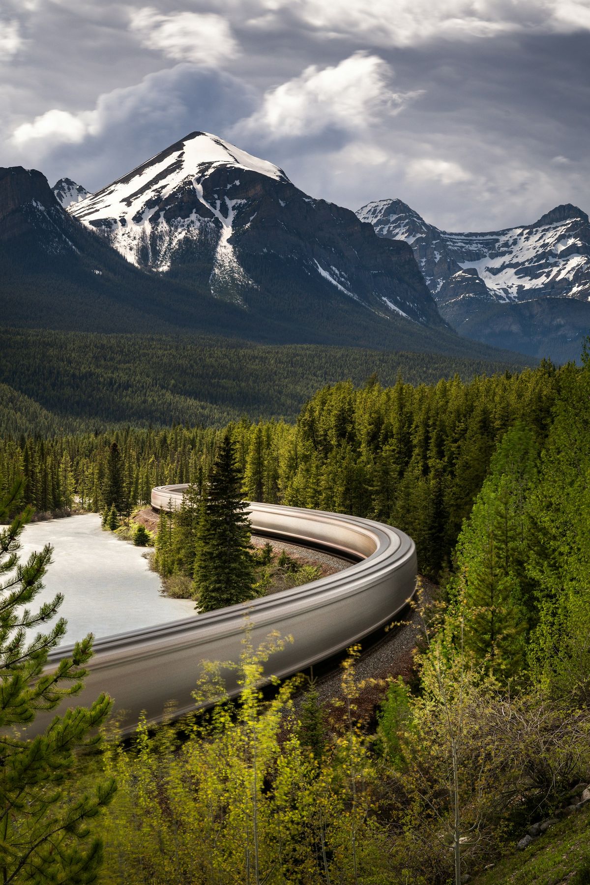 Rocky Mountaineer train winding through the Canadian Rockies