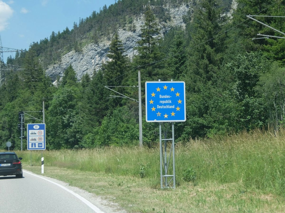European Union border sign beside a mountain road