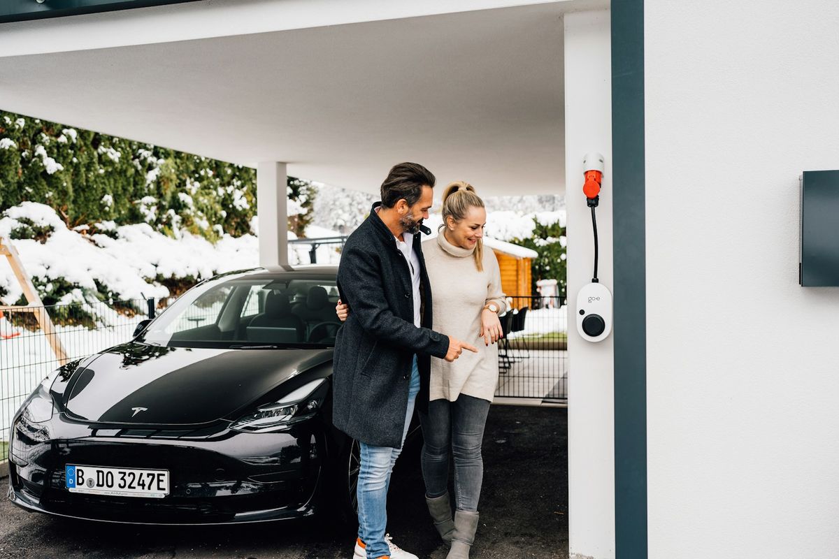 Electric car charging at a public charging station