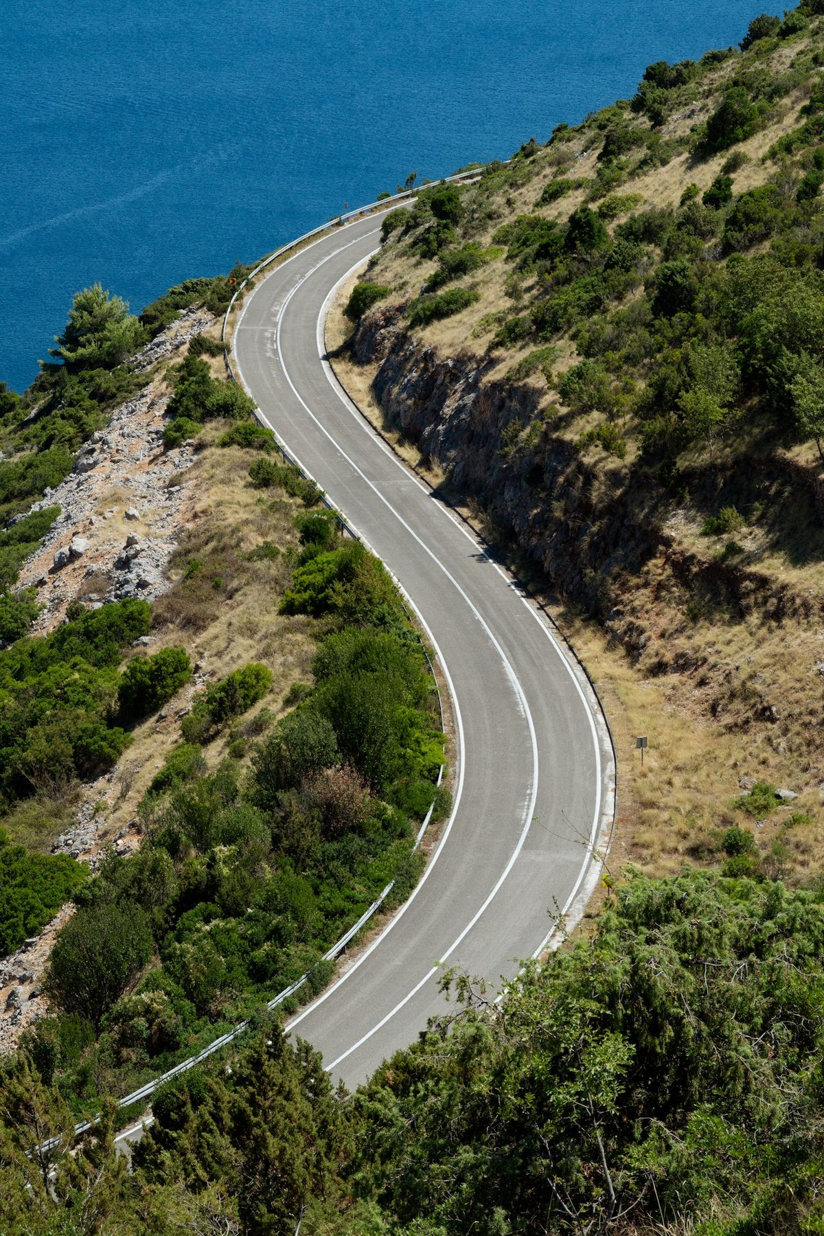 Winding coastal road overlooking the Adriatic Sea in Croatia
