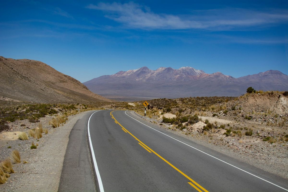Road through the Andes with mountains near Cotopaxi, Ecuador