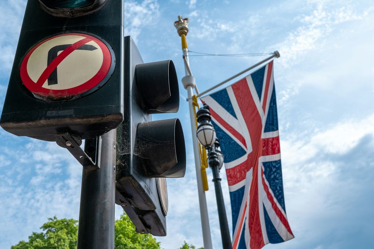 Traffic light no right turn sign and union jack flag