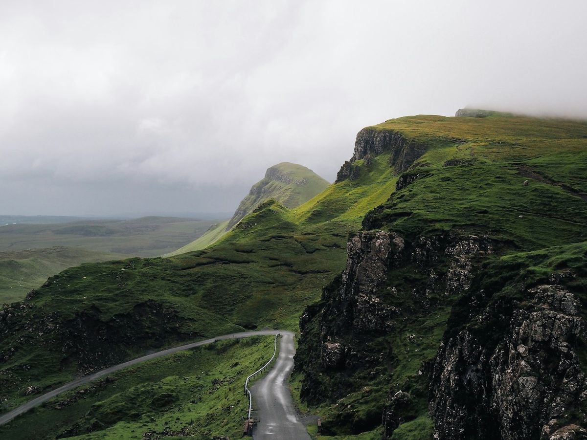 Concrete road between mountains in the Scottish Highlands