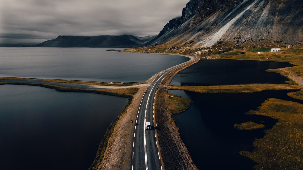 Winding road through Iceland's volcanic landscape along Route 1