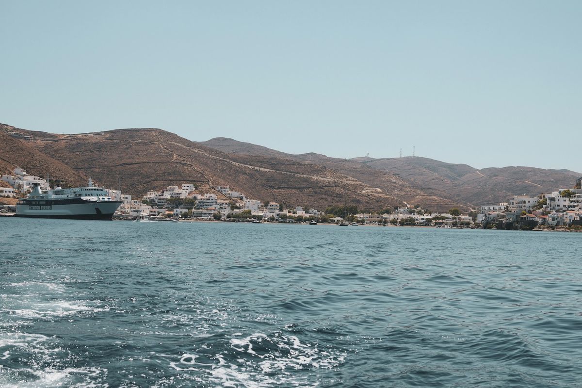 A ferry approaching a Greek island port in the Aegean Sea