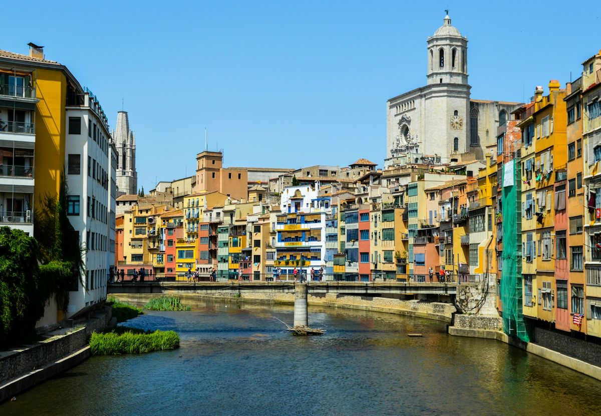 Colourful buildings lining the Onyar river in Girona