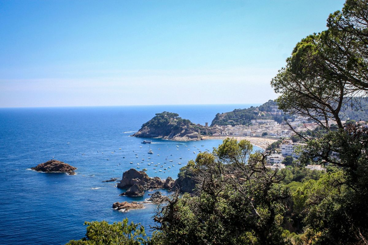Boats in the water at Tossa de Mar on the Costa Brava coastline