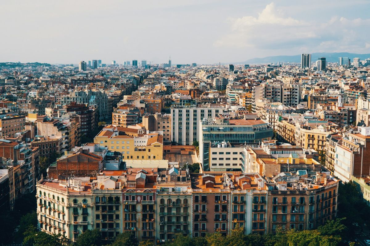 Aerial photography of Barcelona city with grid streets and buildings