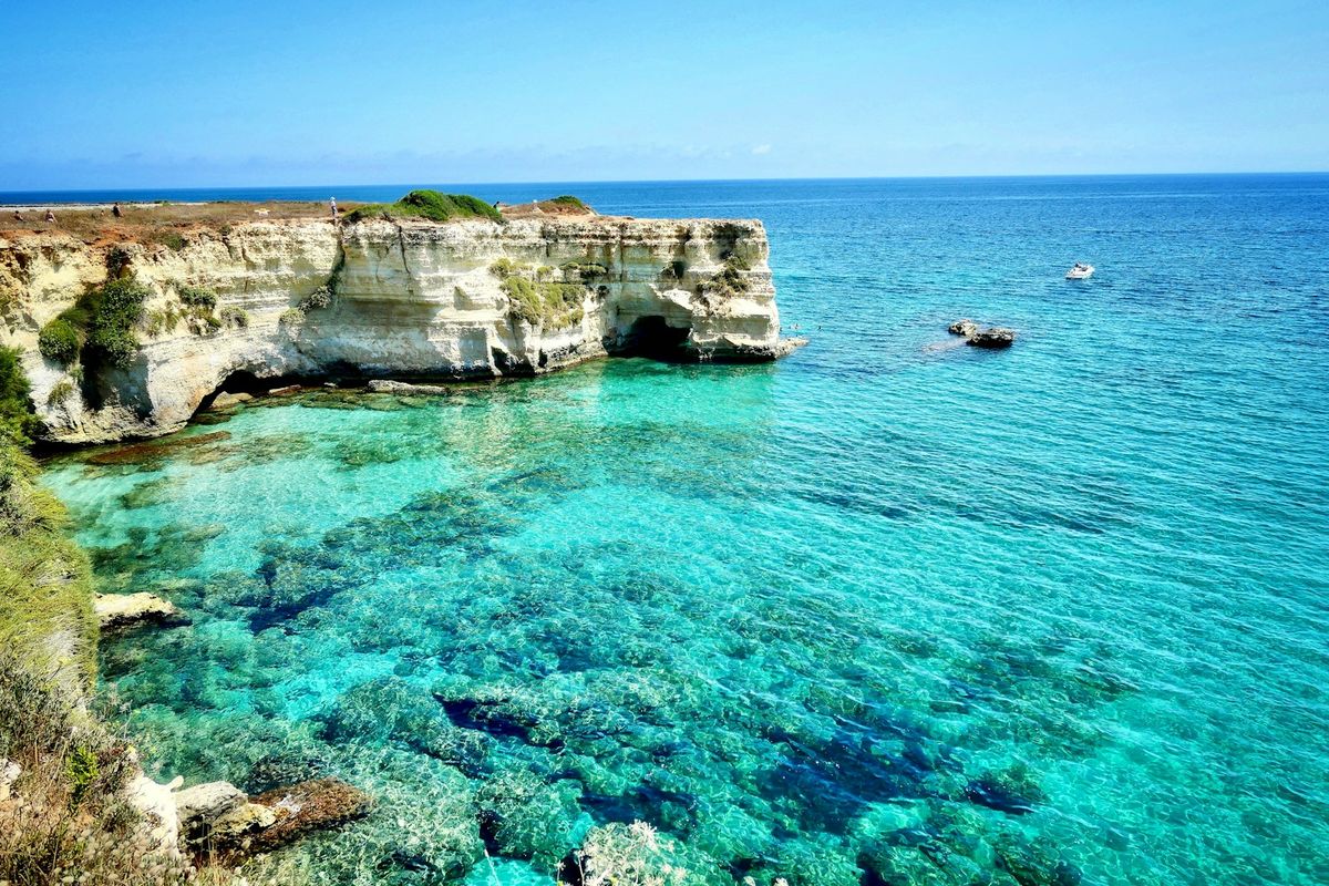 Rocky coastline with blue sea in Puglia Italy