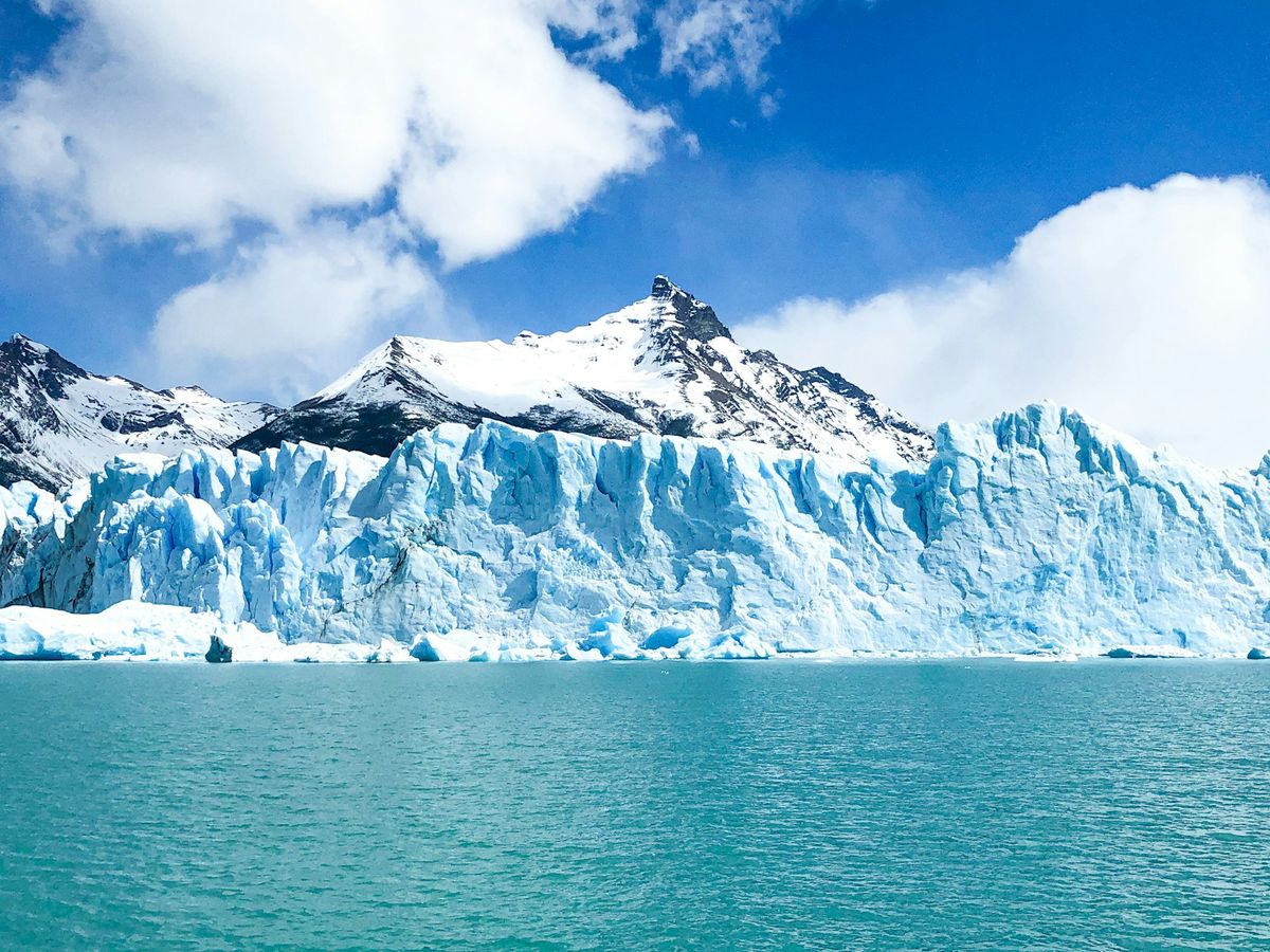 Snow covered mountains near a lake by the glacier in El Calafate, Patagonia