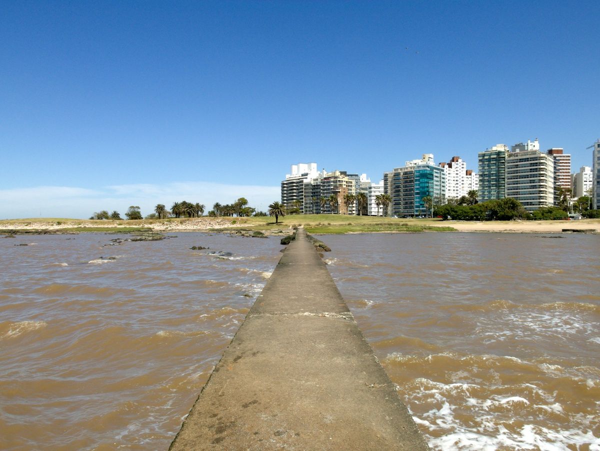 Montevideo waterfront promenade with pedestrian walkway along the beach