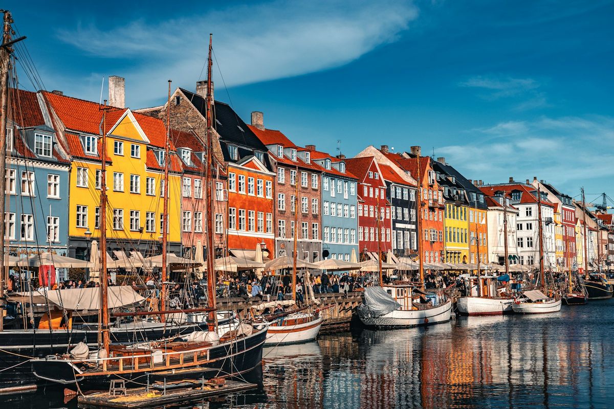 Copenhagen harbor with colorful buildings and boats