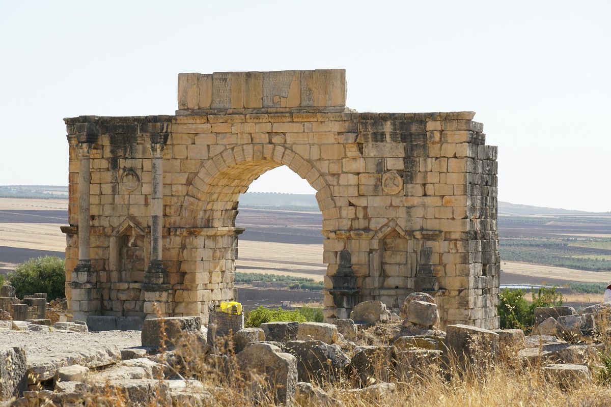 Ancient Roman archway ruins at Volubilis, Morocco