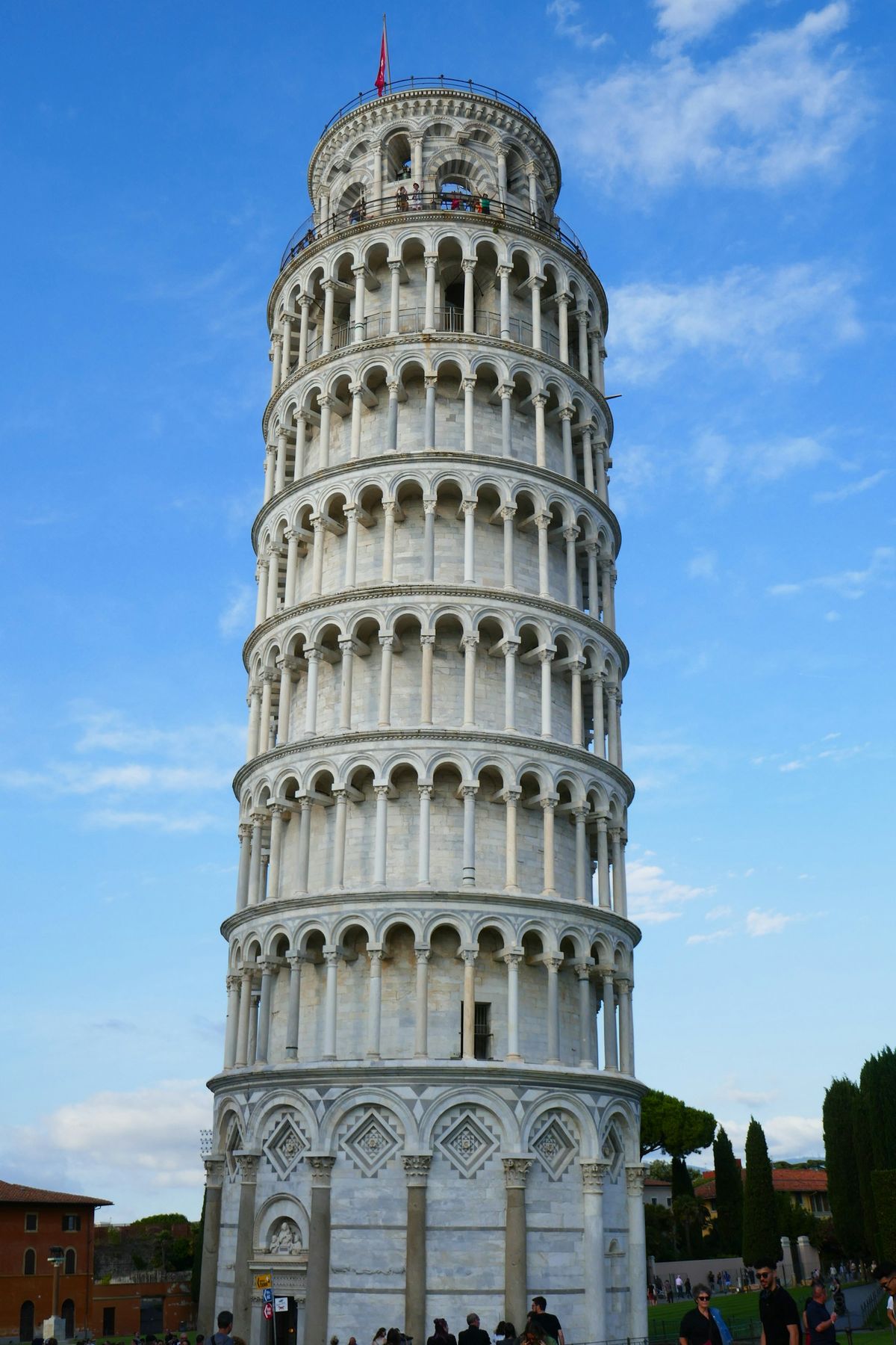 Leaning Tower of Pisa with crowds around its base