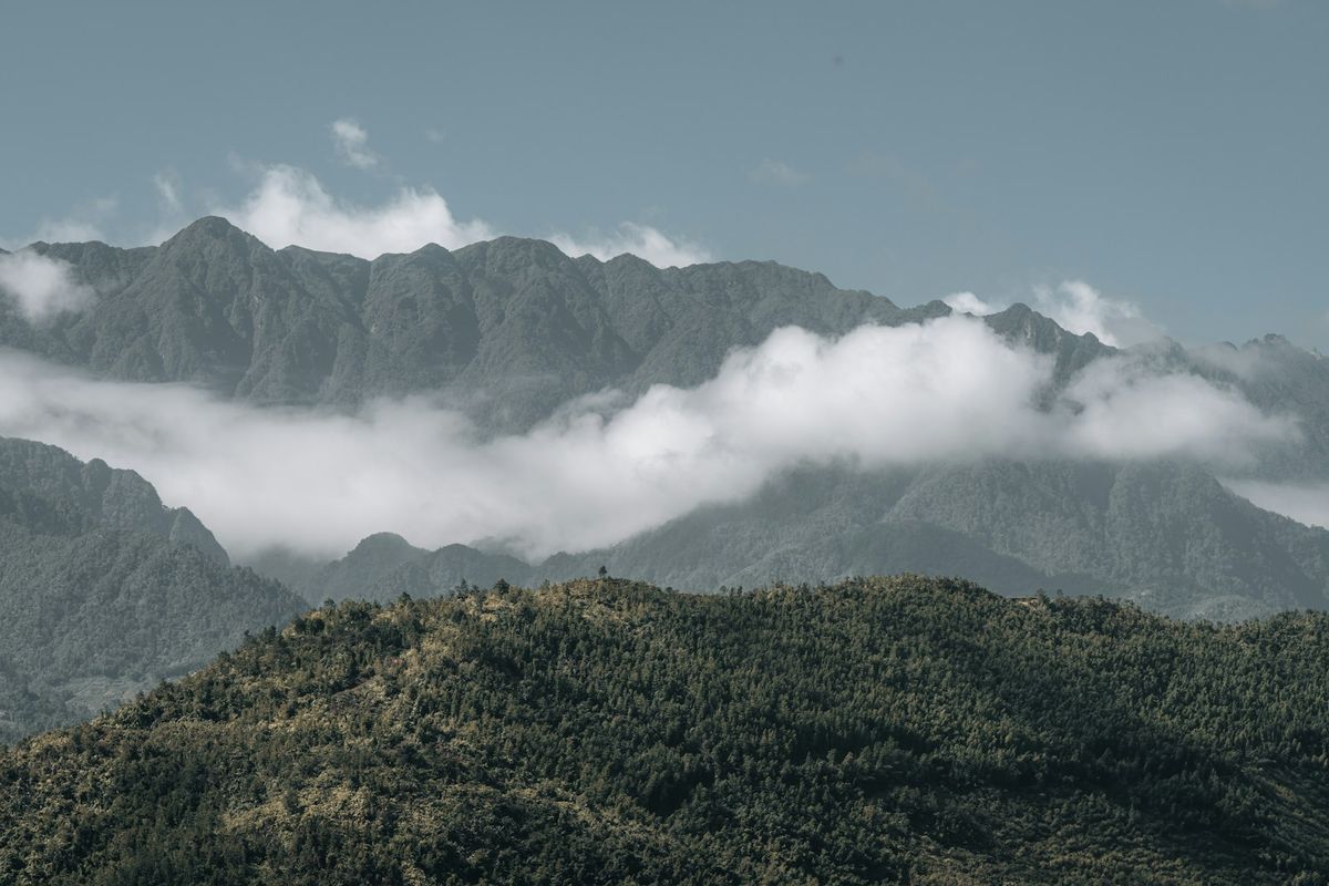 Mountain range with low clouds near Fansipan, Sapa