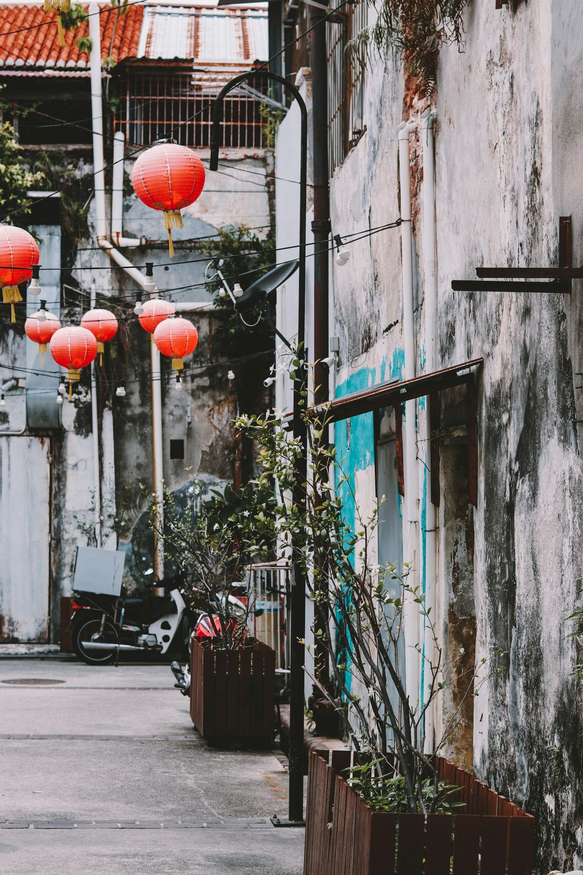 Red lantern hanging in colorful George Town street Penang Malaysia