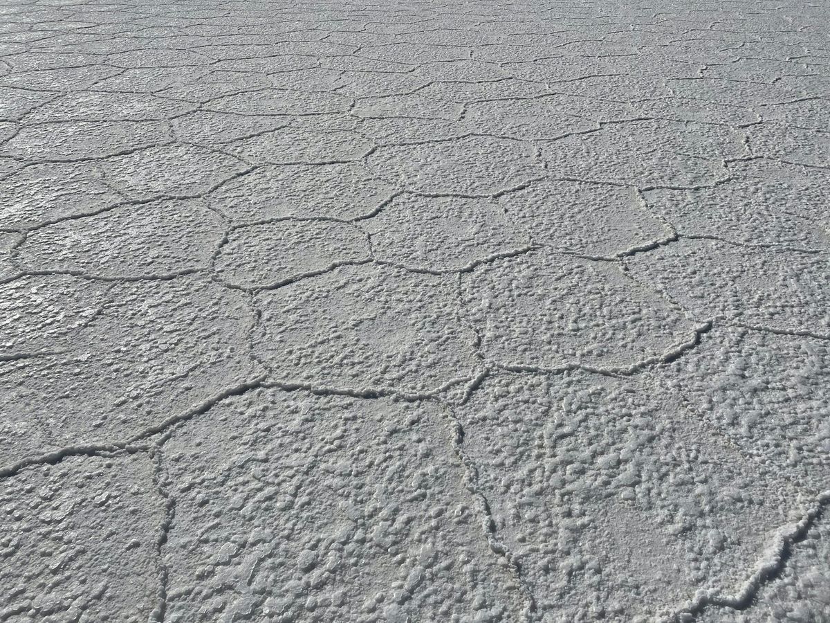 Cracked dry salt crust on the Uyuni salt flats Bolivia