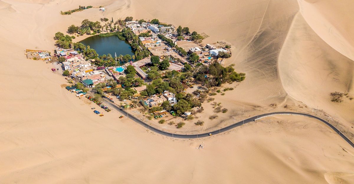 The Huacachina oasis amid sand dunes near Ica, Peru