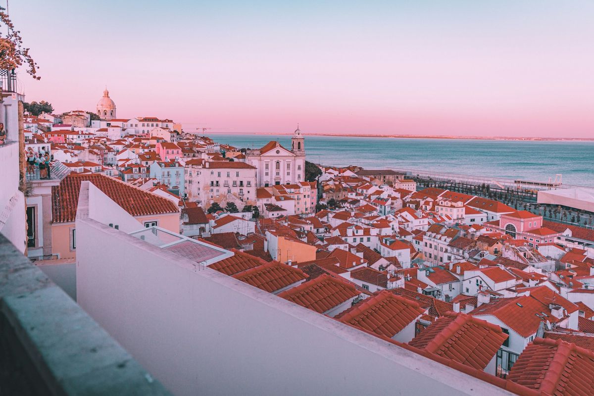 Aerial view of Lisbon city buildings near the sea