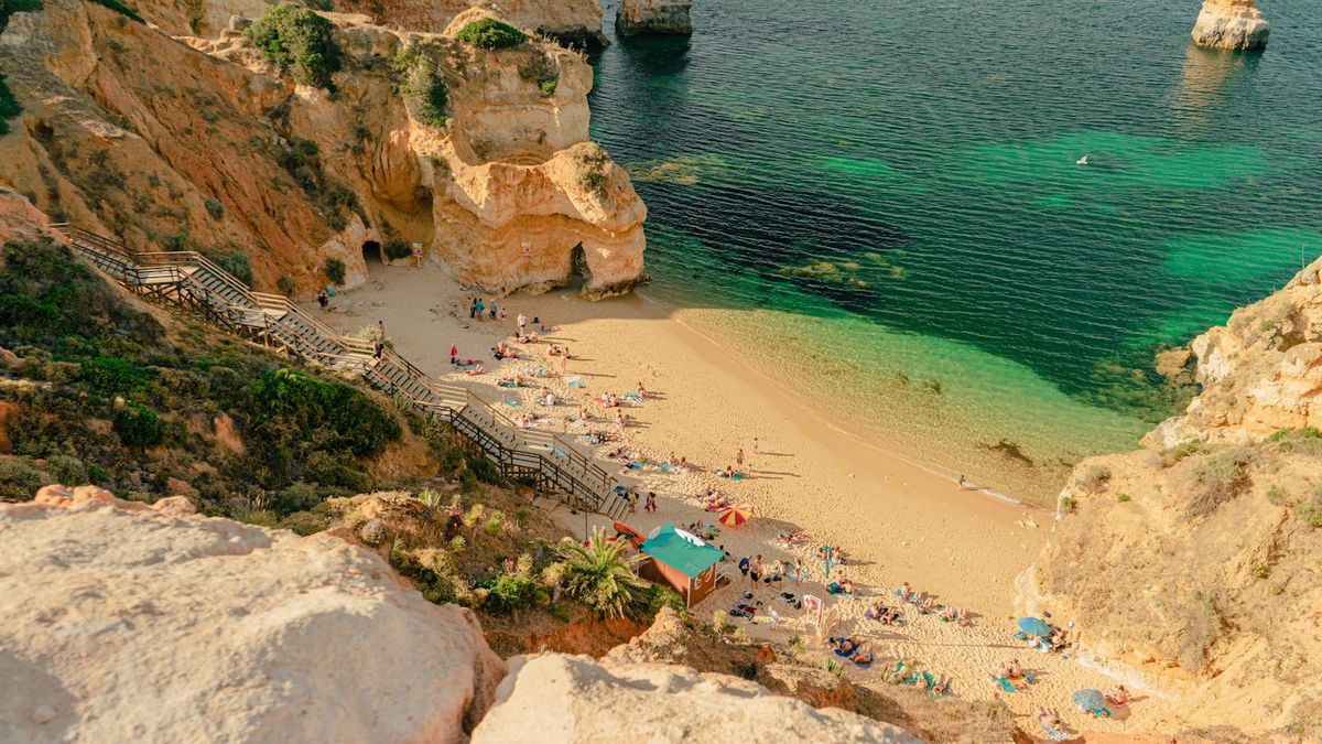 Sandy beach and cliffs at Lagos on Portugal's Algarve coast