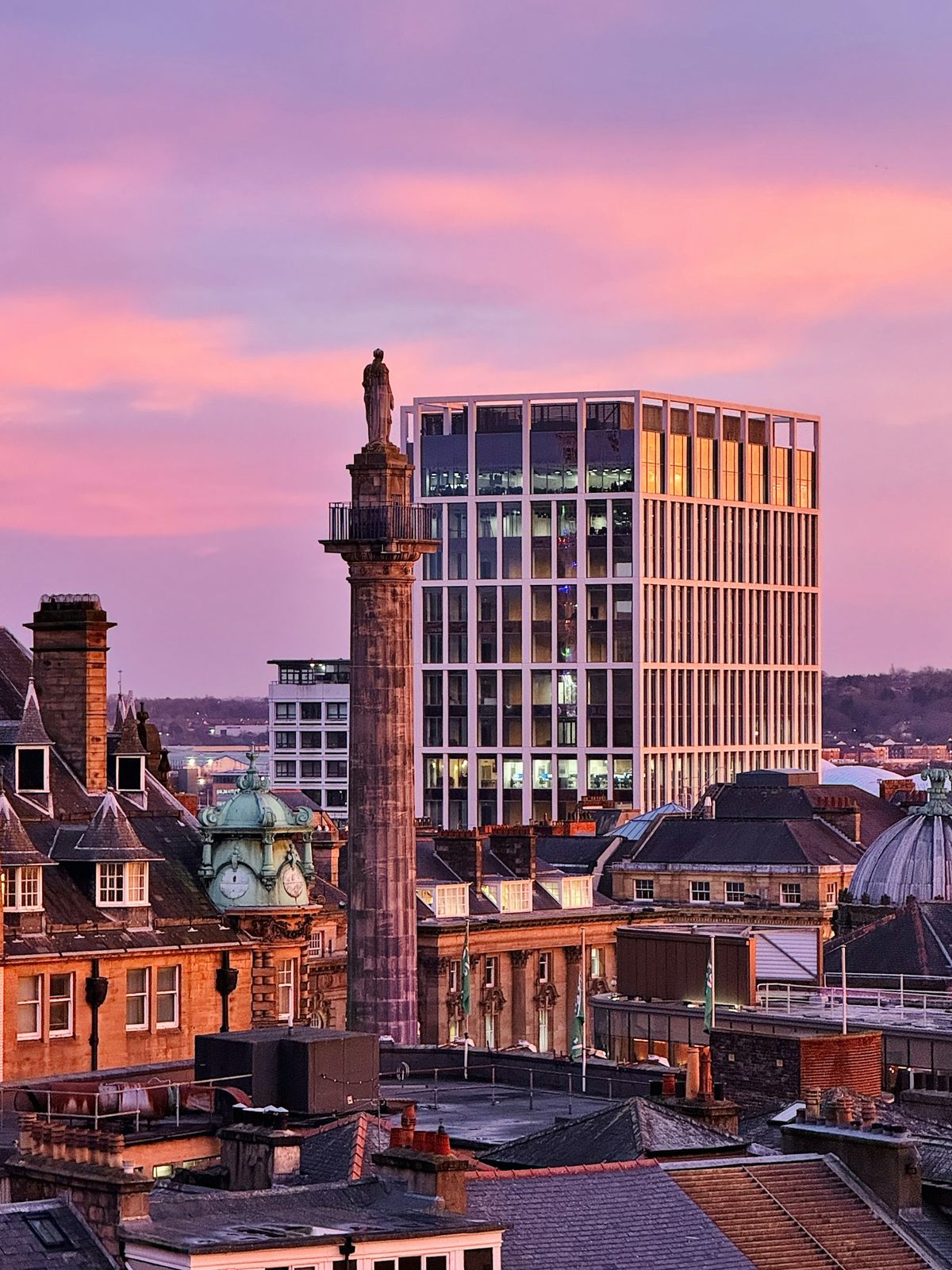 City view with tall buildings and clock tower in Newcastle