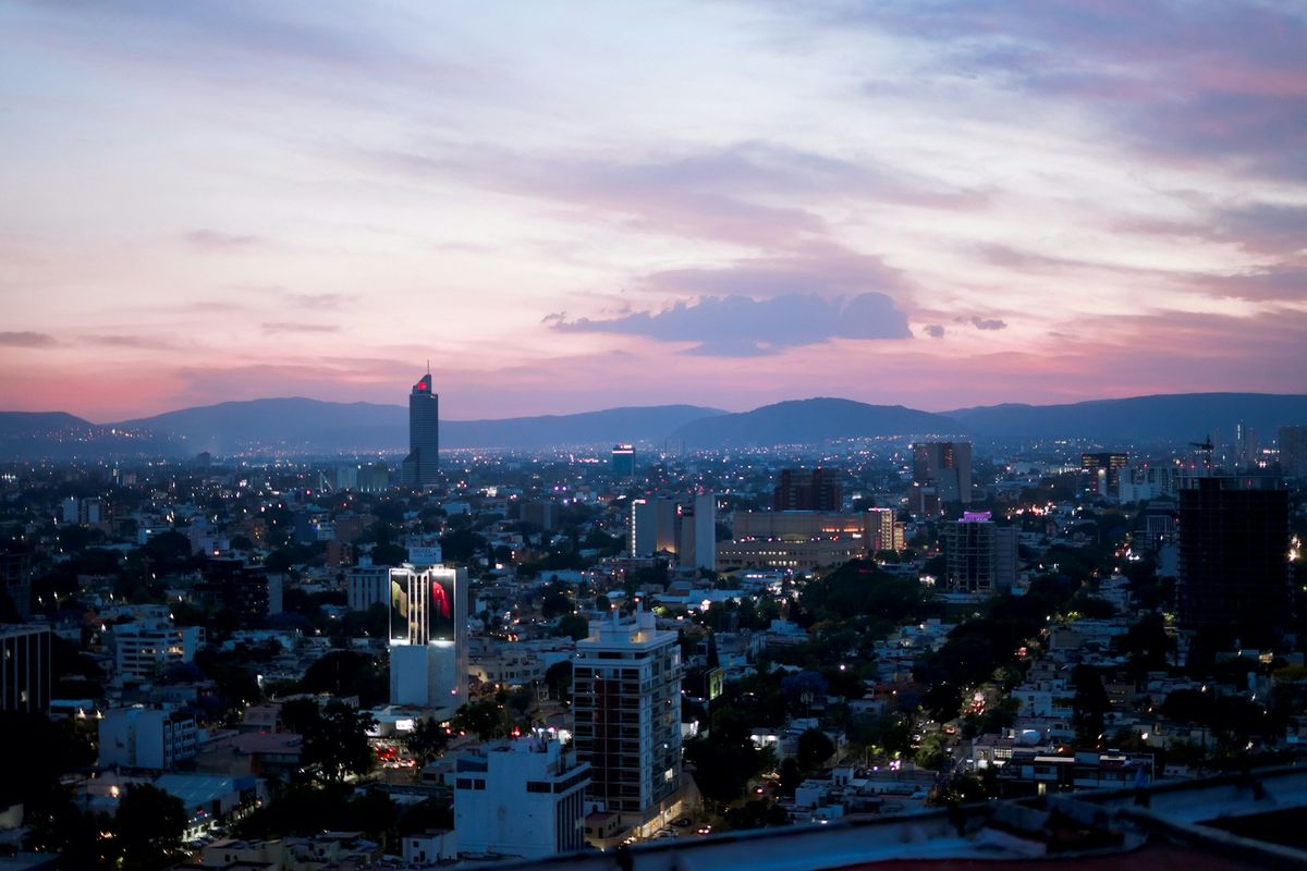 Guadalajara city skyline under cloudy sky, Jalisco