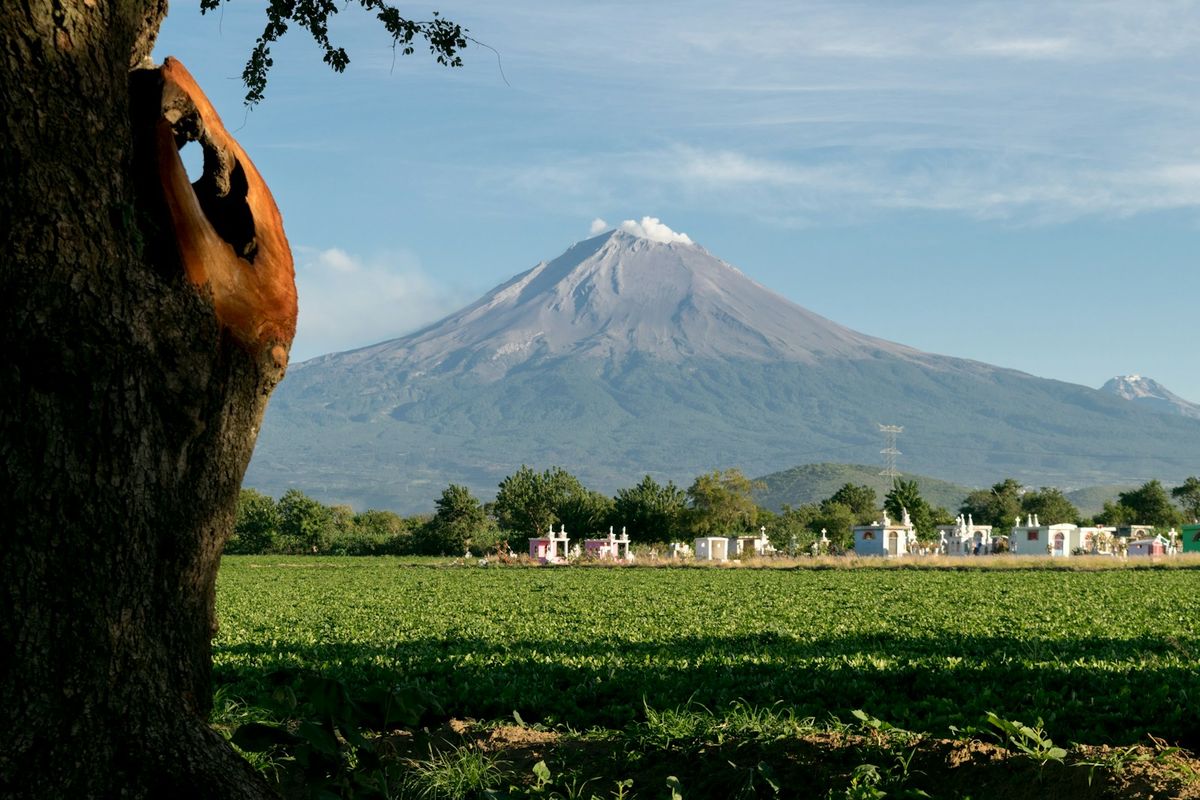 Popocatepetl volcano rising above a village near Puebla, Mexico