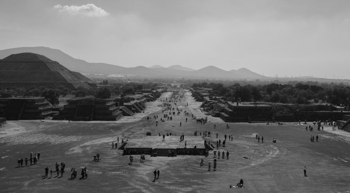 Aerial view of the Avenue of the Dead lined with pyramids at Teotihuacan
