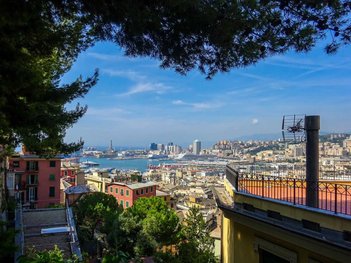 Elevated view of Genoa harbour and city skyline