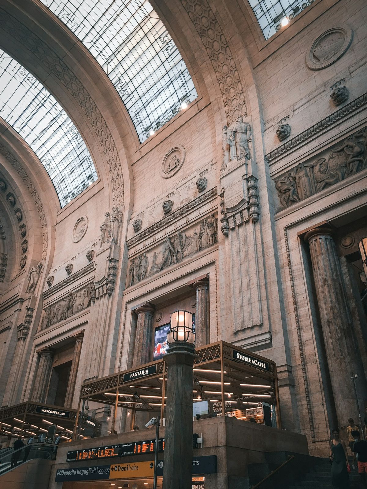 Grand arched ceiling of an Italian train station
