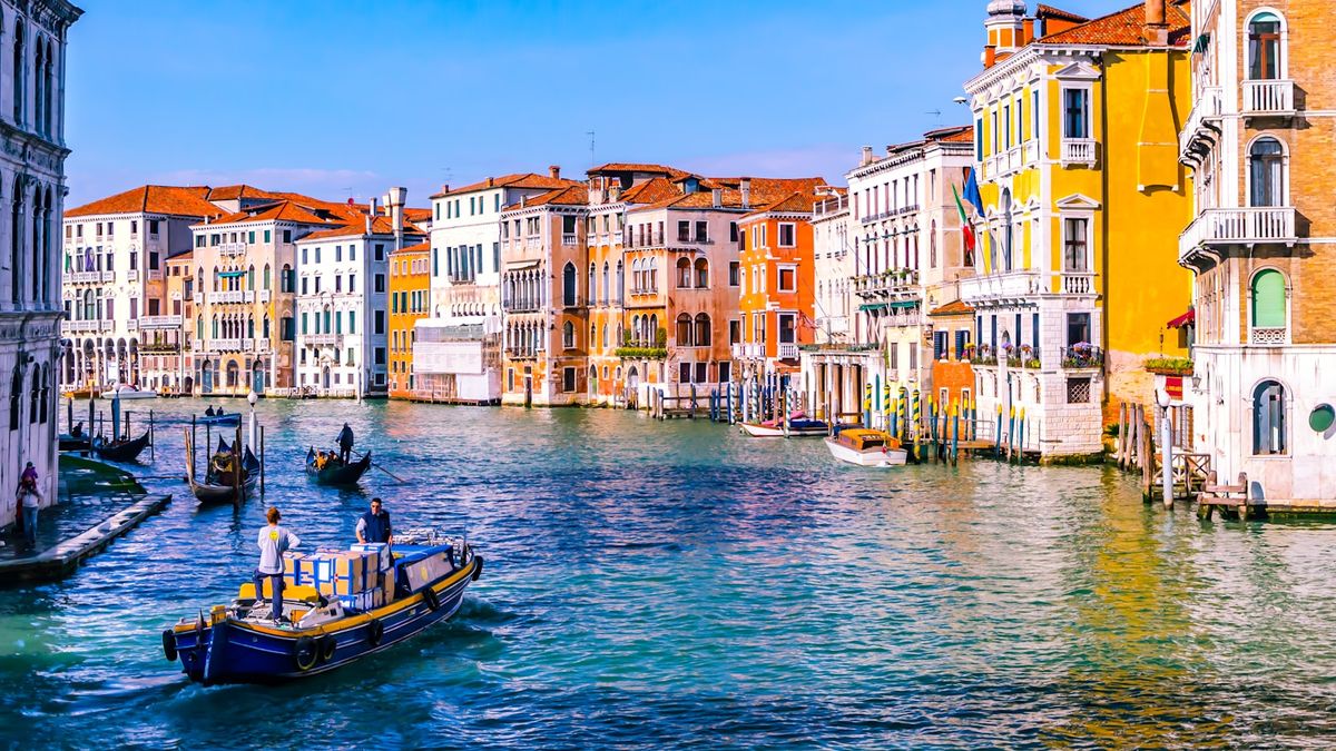 Venice canal view with colorful buildings and boats