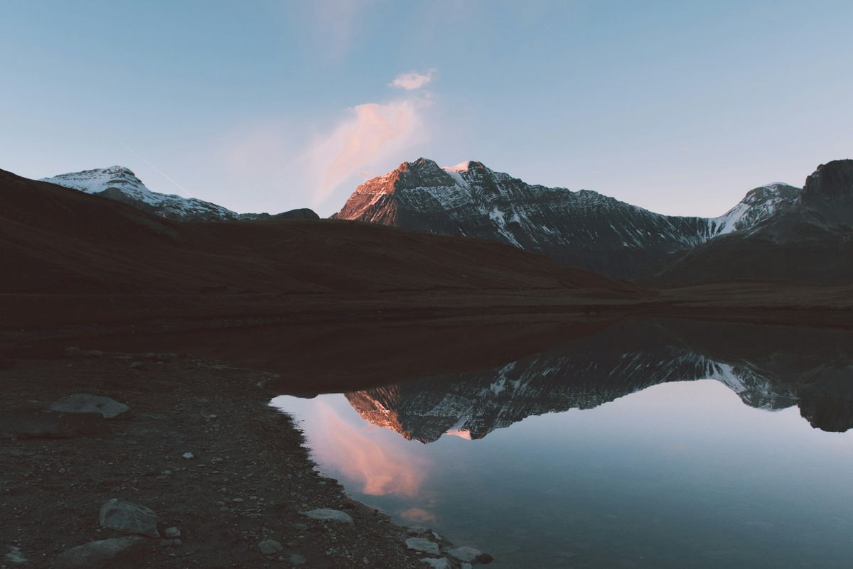 Mountain range reflected in a calm alpine lake near the Zugspitze