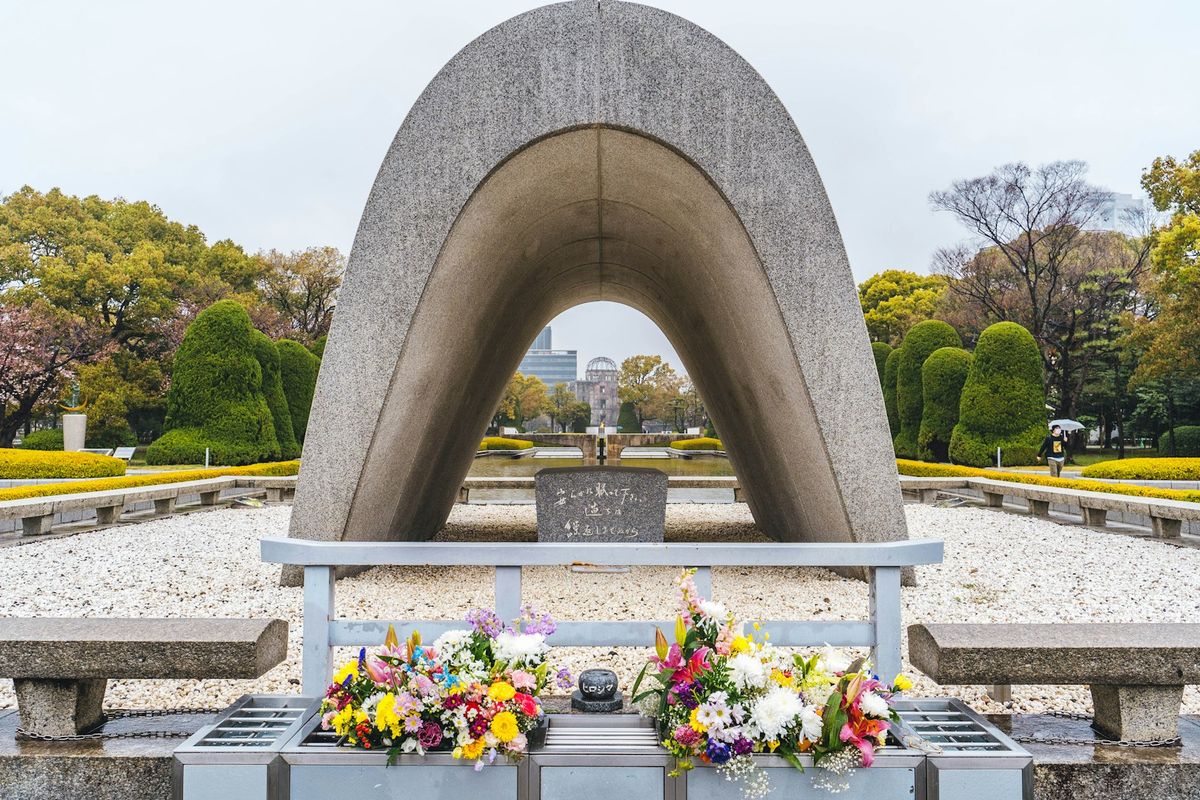 Hiroshima Peace Memorial A-Bomb Dome with flowers in foreground