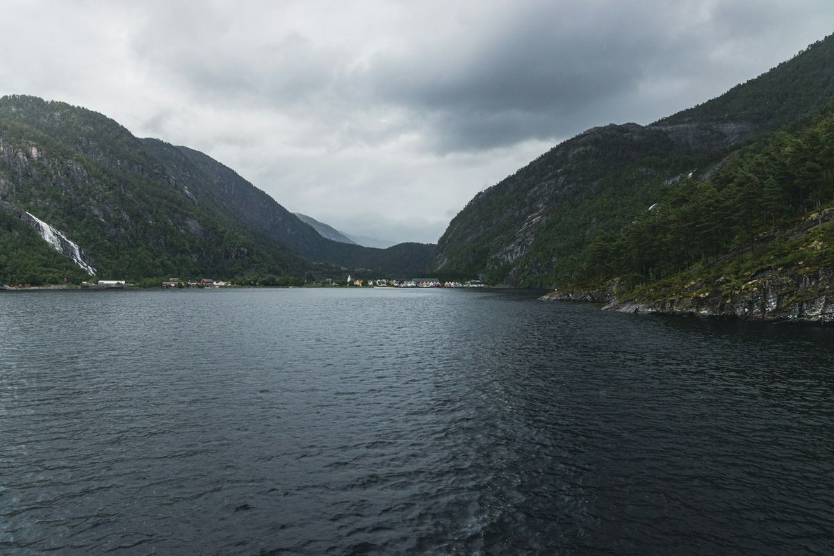 Norwegian mountain landscape with fjord and still water