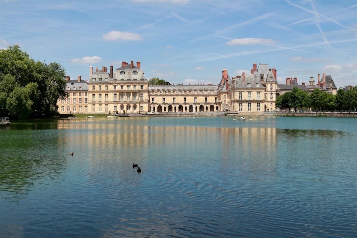 Chateau de Fontainebleau, white building near water, France